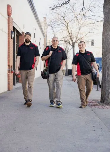 The Independent Lock and Parts team walking in downtown Billings